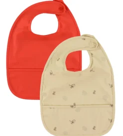 Spisetid|Hagesmække*OYOY Hagesmække - 2-pak - PU - Dino - Butter/Cherry Red